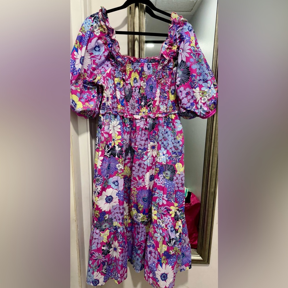 Smocked floral dress with puff sleeves